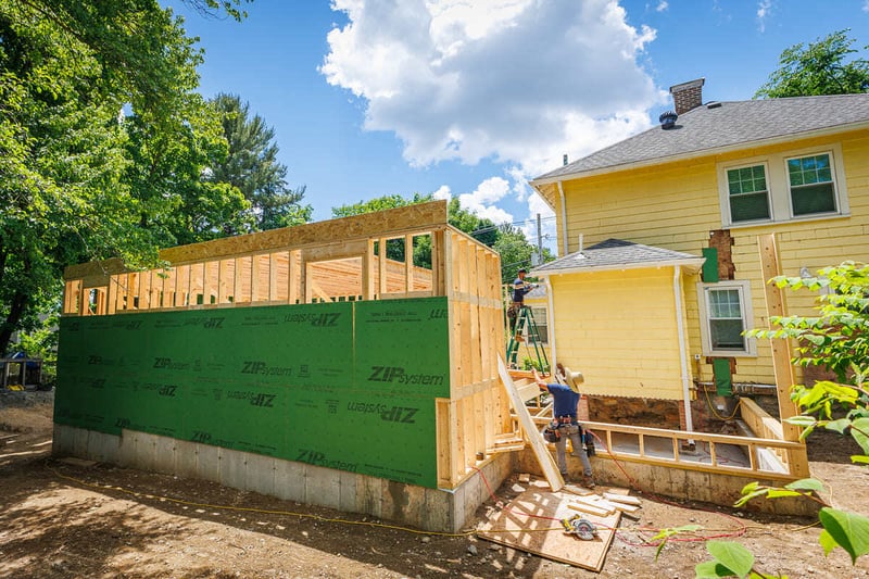 Construction progress of framing in Boston by Honorato Company